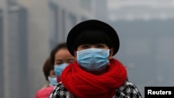 北京過去出現霧霾期間民眾戴上口罩