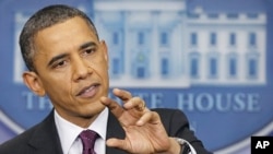 President Barack Obama gestures during a news conference at the White House, Tuesday, March 6, 2012. 
