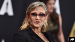 Carrie Fisher arrives at the Governors Awards at the Dolby Ballroom, Nov. 14, 2015, in Los Angeles. 