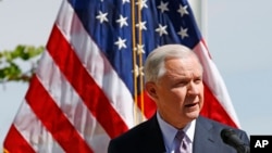 FILE - Attorney General Jeff Sessions speaks at a news conference after touring the U.S.-Mexico border, April 11, 2017, in Nogales, Ariz. Sessions announced making immigration enforcement a key Justice Department priority.