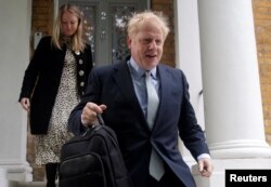 PM hopeful Boris Johnson leaves his home in London, Britain, June 13, 2019.