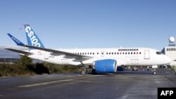FILE - A Bombardier CSeries aircraft is shown on the tarmac at Mirabel, Quebec, Sept. 16, 2013.