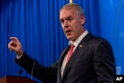 FILE - Interior Secretary Ryan Zinke speaks on the Trump administration's energy policy at the Heritage Foundation in Washington, Sept. 29, 2017.