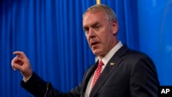 FILE - Interior Secretary Ryan Zinke speaks on the Trump administration's energy policy at the Heritage Foundation in Washington, Sept. 29, 2017.