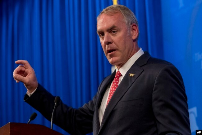 FILE - Interior Secretary Ryan Zinke speaks at the Heritage Foundation in Washington, Sept. 29, 2017.