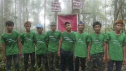 In this May 2020 photo provided by the Southern Youth Development Organization, local community members pose for a photo during a forest inventory and data collection session in the Lenya area of the Tanintharyi region in southern Myanmar.