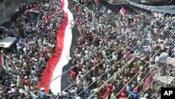 An image taken from a video uploaded on YouTube shows Syrian anti-government demonstrators marching in the coastal city of Latakia on August 12, 2011
AFP IS USING PICTURES FROM ALTERNATIVE SOURCES AS IT WAS NOT AUTHORISED TO COVER THIS EVENT, THEREFORE I