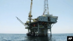 FILE - Photo provided by the California State Lands Commission shows Platform Holly, an oil drilling rig in the Santa Barbara Channel offshore of the city of Goleta, California.