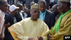 FILE - Former Prime Minister Seïni Oumarou, leader of the opposition Patriotic and Republican Front in Niger, attends a rally in Niamey ahead of the country's 2016 presidential election, Nov. 1, 2015.