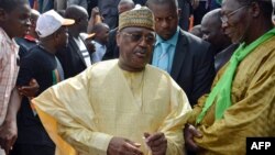 FILE - Former Prime Minister Seïni Oumarou, leader of the opposition Patriotic and Republican Front in Niger, attends a rally in Niamey ahead of the country's 2016 presidential election, Nov. 1, 2015.