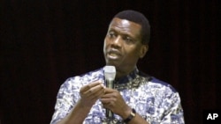 Pastor Enoch Adejare Adeboye, leader of the Redeemed Christian Church of God, preaches to the congregation at the redeemed camp during the Holy Ghost all-night revival in Lagos, Nigeria. (file photo)
