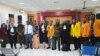 Tujuh tapol Papua bersama penasihat hukumnya saat berada di PN Balikpapan, Kalimantan Timur. (Foto: Koalisi Penegak Hukum dan HAM Papua). 