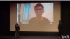 香港學生運動領袖黃之鋒通過Skype跟觀眾進行了實時交流。（視頻截圖）