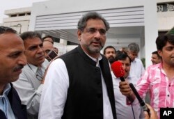 FILE - Pakistan's lower house of parliament on Tuesday elected Shahid Khaqan Abbasi, shown in Islamabad, Pakistan, July 31, 2017, as the country's new prime minister.