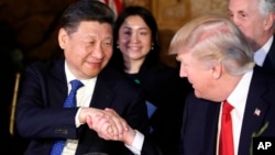 President Donald Trump shakes hands with Chinese President Xi Jinping during a dinner at Mar-a-Lago, April 6, 2017, in Palm Beach, Florida.
