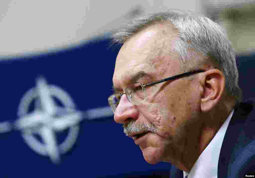 Ukrainian Ambassador to NATO, Ihor Dolhov, holds a news conference after an emergency NATO-Ukraine meeting at the Alliance headquarters in Brussels, Belgium, Aug. 29, 2014.