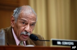 FILE - Rep. John Conyers, D-Mich., speaks during a hearing on Capitol Hill, in Washington, April 4, 2017.