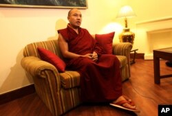 Tibetan spiritual leader the 17th Karmapa Ogyen Trinley Dorje speaks to the Associated Press about the role of world citizens in environmental protection, in New Delhi, India, Nov. 8, 2013.