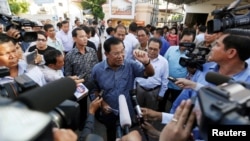 FILE: Cambodia's Prime Minister Hun Sen speaks to the media after registering for next year's local elections, in Kandal province, Cambodia September 1, 2016. (REUTERS/Samrang Pring)