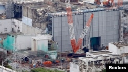 An aerial view shows the No.3 reactor building at Tokyo Electric Power Co. [TEPCO]'s tsunami-crippled Fukushima Daiichi nuclear power plant in Fukushima Prefecture, July 18, 2013.