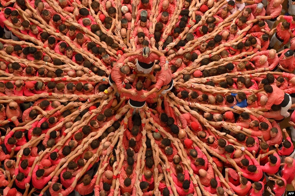 Members of the &quot;Colla Vella dels Xiquets de Valls&quot; team form a &quot;castell&quot; (human tower) during the XXVI human towers, or &#39;castells&#39;, competetion in Tarragona, Spain, Oct. 2, 2016.