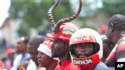 FILE: Supporters of Zimbabwe's main opposition leader, Nelson Chamisa listen to his speech at a gathering in Harare, Tuesday, Jan, 21, 2020. 