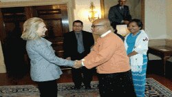 U.S. Secretary of State Hillary Rodham Clinton greets Burmese comedian & former political prisoner Zaganar