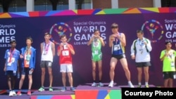 Thay Sokunthim won a gold medal for the 200 meter race at the Special Olympic World Games in Los Angeles, July 25th to August 2, 2015. (Courtesy photo of Cambodian Special Olympic Delegation)