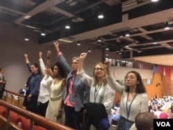 About 75 female and male staff members protested, Oct. 21, 2016, in the U.N. lobby before the designation of Wonder Woman as a U.N. Honorary Ambassador for the Empowerment of Women and Girls.