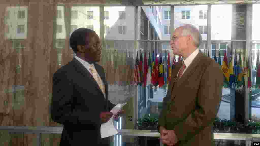 US Special Envoy for South Sudan and Sudan Donald Booth (R), shown here with South Sudan in Focus host John Tanza, urged South Sudan on Monday not to fall back into violence, but refused to call the overnight unrest in Juba an attempted coup.