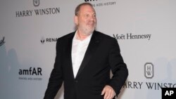 Harvey Weinstein poses for photographers upon arrival at the amfAR charity gala during the Cannes 70th international film festival, Cap d'Antibes, southern France, May 25, 2017. 