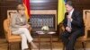 Merkel Visits Kyiv for Crisis Talks; Russian Aid Convoy Leaves