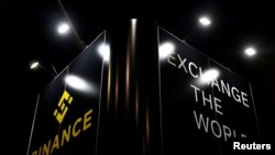 Logo digitalne valute "Binance" viđen je na sajmu digitalnih valuta i kripto na Malti (foto: Reuters).