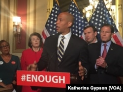 FILE - Democratic Sen. Cory Booker of New Jersey calls for gun control legislation in the wake of the mass shooting in an Orlando LGBT nightclub earlier this week during a news conference on Capitol Hill in Washington, June 16, 2016.