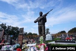 The grave of a Bosnian Serb soldier. All sides are meticulous in tending the graves of the dead from the Balkan wars of the 1990s that erupted as Yugoslavia fractured.