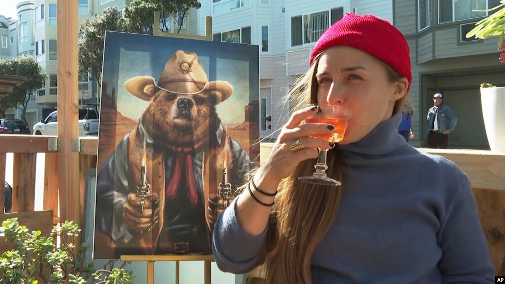 In this Feb. 12, 2021 photo, a customer drinks an alcohol-free cocktail at San Francisco's zero-proof bar Ocean Beach Cafe. (AP Photo/Haven Daley)