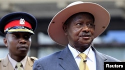 Uganda's President Yoweri Museveni has pledged to sign a bill punishing homosexuals with 14 years to life in prison. He is shown at the 2012 summit of the East African Community Heads of State in Nairobi.
