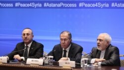 Russian Foreign Minister Sergei Lavrov (C), Iranian Foreign Minister Mohammad Javad Zarif (R) and Turkish Foreign Minister Mevlut Cavusoglu attend a meeting on Syria in Astana on March 16, 2018. (Alexey Filippov/AFP)