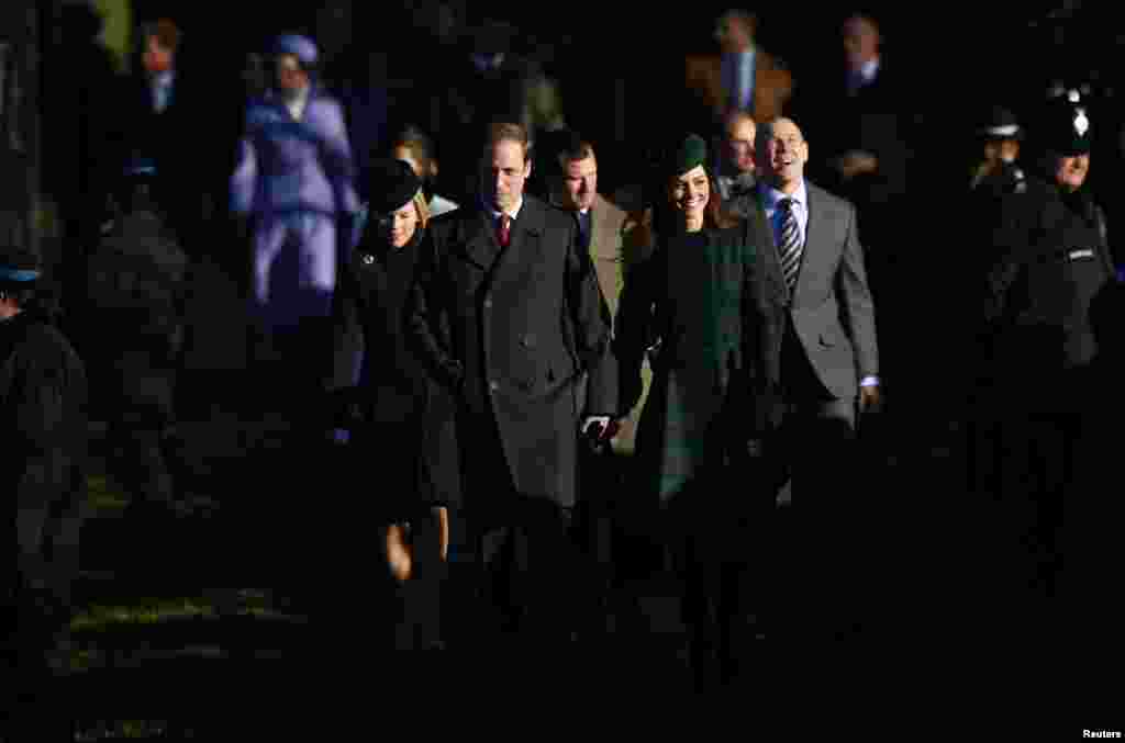 Britain's Prince William and Catherine, the Duchess of Cambridge, walk to a Christmas Day morning service at the church on the Sandringham Estate in Norfolk, eastern England, Dec. 25, 2013. 