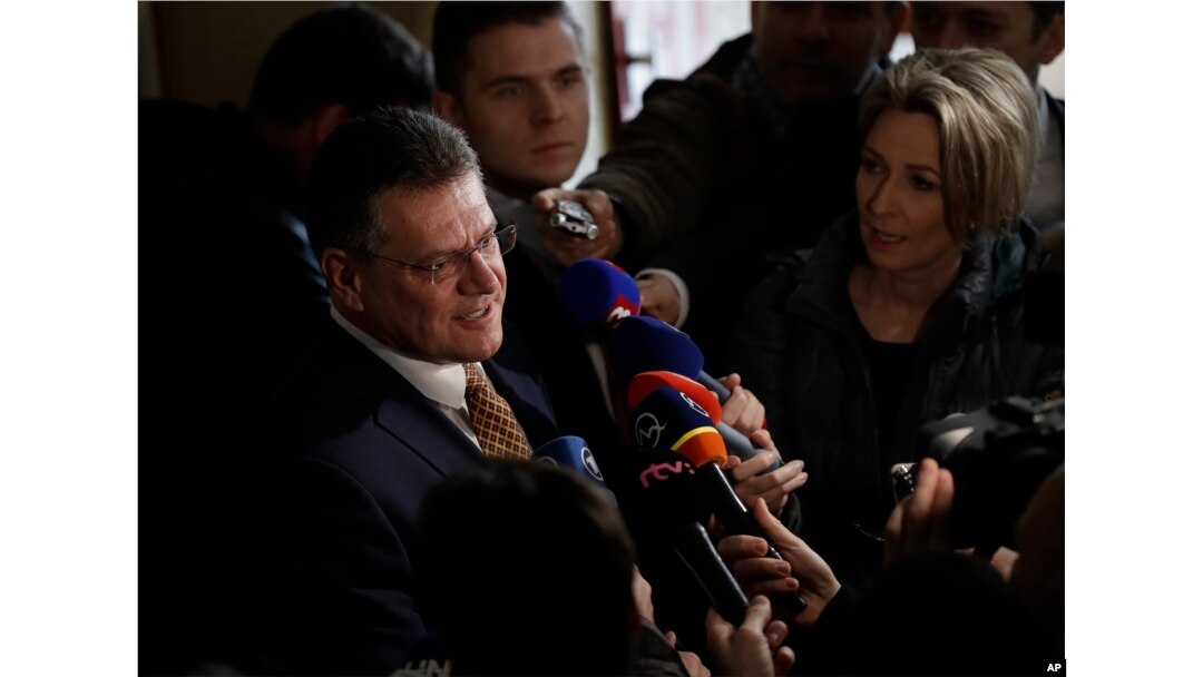 FILE - Presidential candidate and European Commission Vice President Maros Sefcovic speaks to media after casting his vote during the first round of presidential elections, in Bratislava, Slovakia, March 16, 2019.