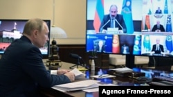 Russian President Vladimir Putin participates in an online meeting of the Russia-led Collective Security Treaty Organization (CSTO) focused on the situation in Kazakhstan in the wake of violent protests, at the Novo-Ogaryovo state residence, outside Mosco