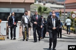 US Charge d'affairs Philip Kosnett (3rd-L) leaves after the trial of US Pastor Andrew Brunson who is datained in Turkey for over a year on Terror charges, in Aliaga, north of Izmir, on July 18, 2018.