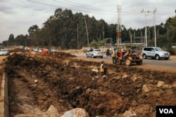 In this August 2020 photo, a section of Ngong Road is seen in the Karen neighborhood in Nairobi under construction. The project is part of Kenya's attempt to mitigate the growing traffic problem in the capital. (Kang-Chun Cheng/VOA)