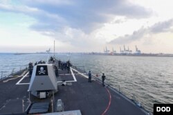 The Arleigh Burke-class guided-missile destroyer USS Kidd arrives off the coast of India in preparation for Malabar 2017, a series of exercises between the Indian Navy, Japan Maritime Self Defense Force and U.S. Navy.