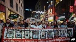 Thousands of pro-Palestinian activists and demonstrators they march towards the Taksim Square in Istanbul, Turkey, May 30, 2011 as they marked the first anniversary of a deadly raid by Israel on a Turkish aid ship bound for the Gaza Strip.