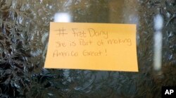 A sticky note calling for freeing 22-year old Daniela Vargas, an Argentine native who has lived in the United States since she was 7 years old, was placed on a lawmaker's office door at the Capitol in Jackson, Mississippi, March 3, 2017.