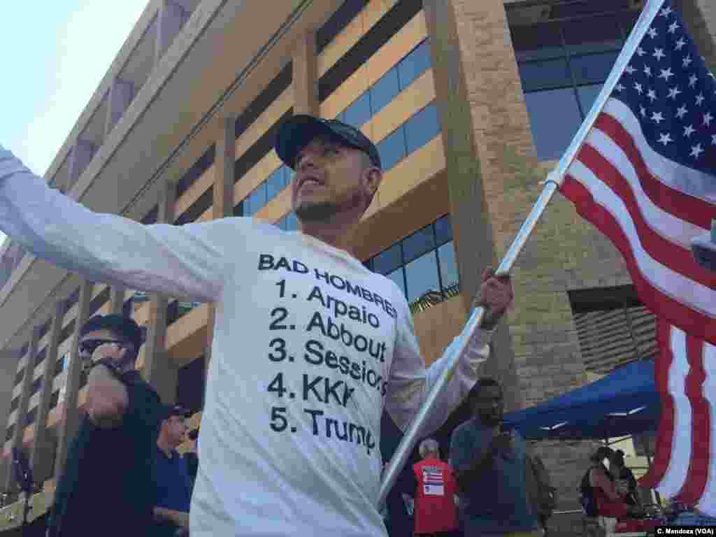Activist Hugo Torres, 41, of Tucson, Arizona, was born in Mexico and raised in Los Angeles. He joined the protest in Phoenix, Aug. 22, 2017.