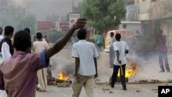 In this citizen journalism image, tires burn during a protest in Khartoum, Sudan. Sudanese security forces used tear gas to break up anti-regime demonstrations in Khartoum,according to reports.
