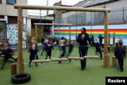 Maxine Mallett, 52, a headteacher at Rutherford House School, poses for a photograph at the school's playground in south London, Britain, Feb. 22, 2017.