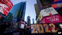 The 2022 sign that will be lit on top of a building on New Year's Eve is displayed in Times Square, New York City, Dec. 20, 2021.